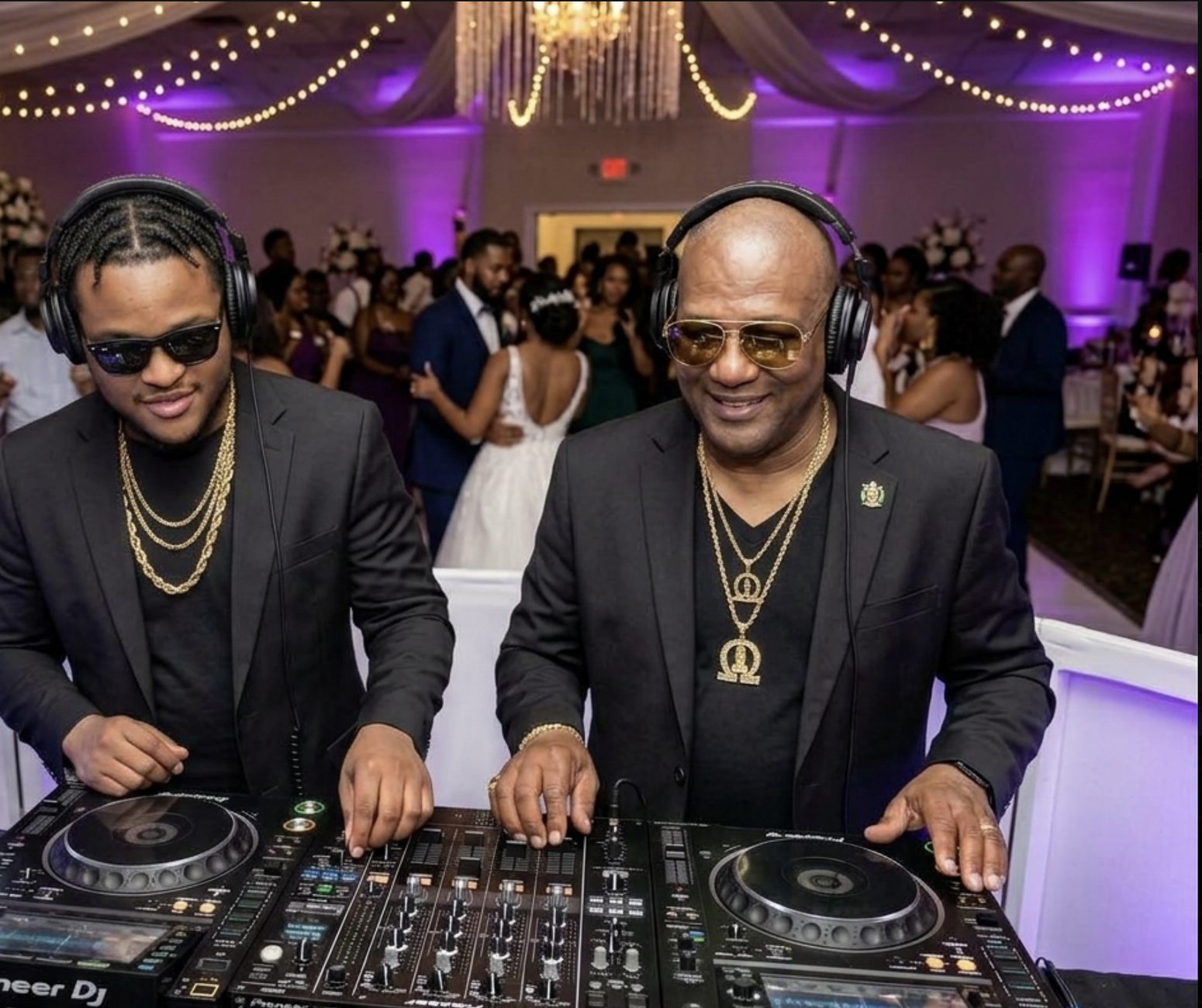 Two DJs mixing on Pioneer decks at a wedding reception