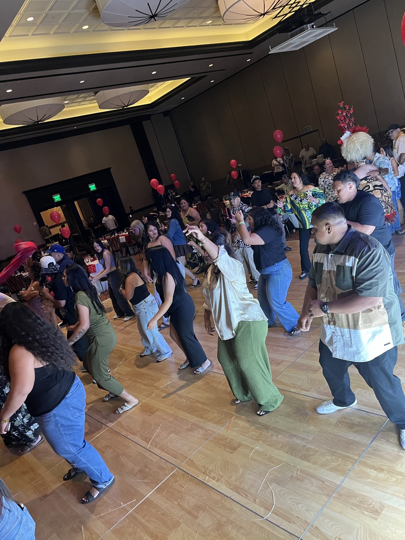 Guests dancing together on a crowded dance floor