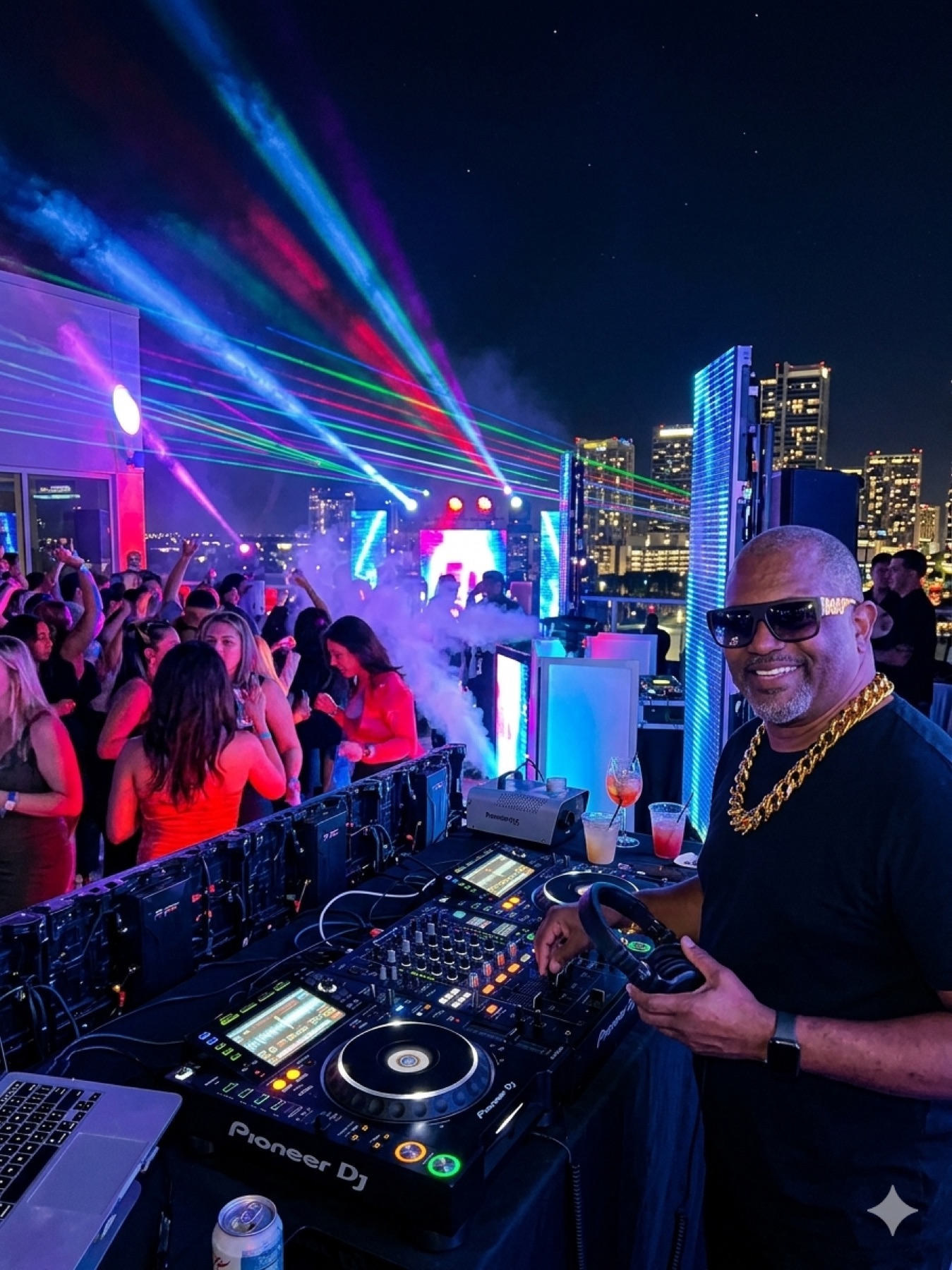 DJ in sunglasses at Pioneer DJ decks on a rooftop with lasers and a city skyline