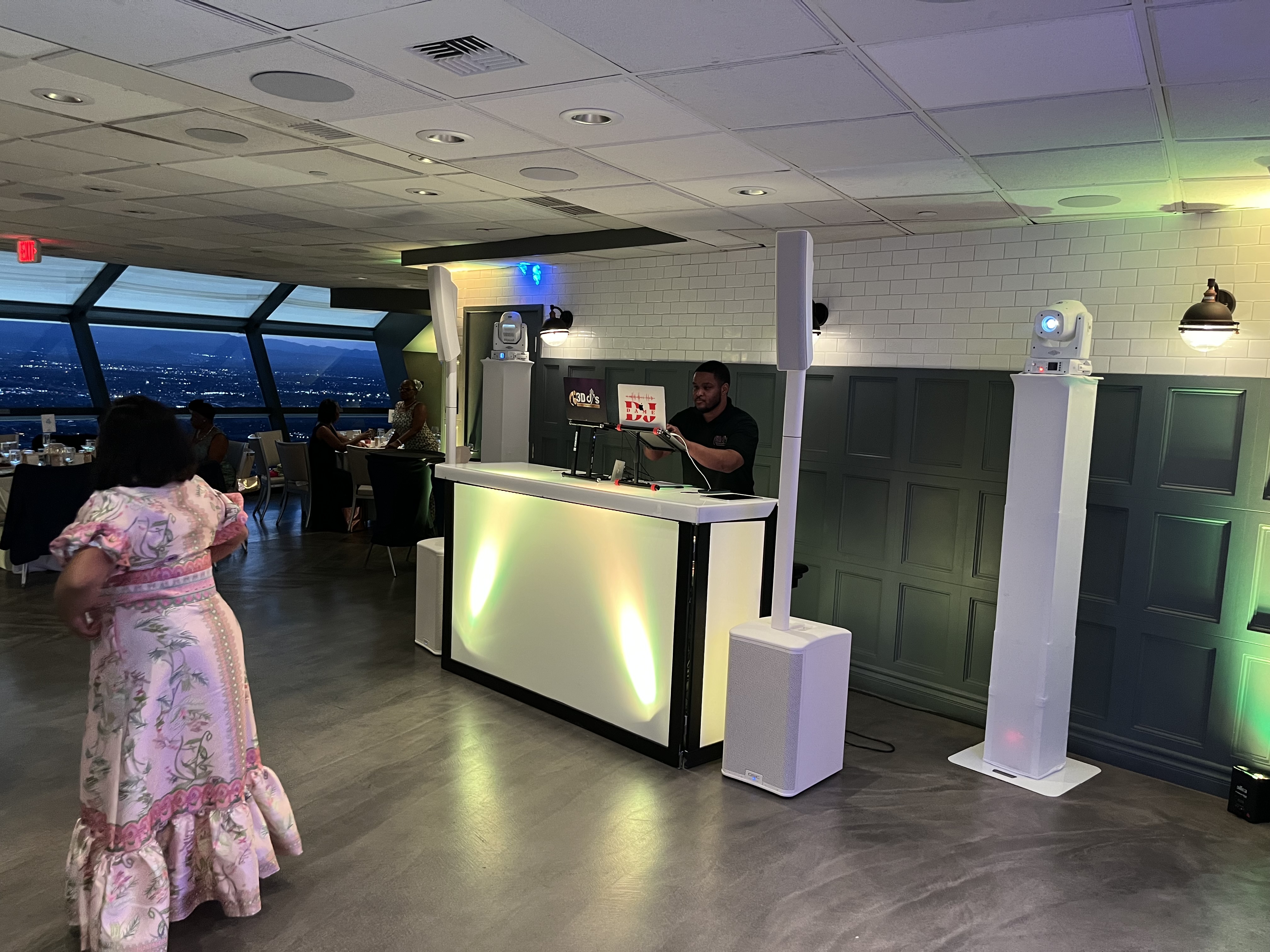DJ booth setup with Las Vegas skyline